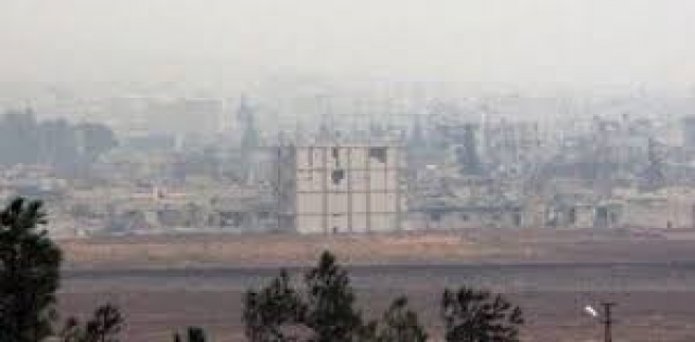 KOBANİDE YAĞMUR ALTINDA ÇATIŞMA DEVAM EDİYOR